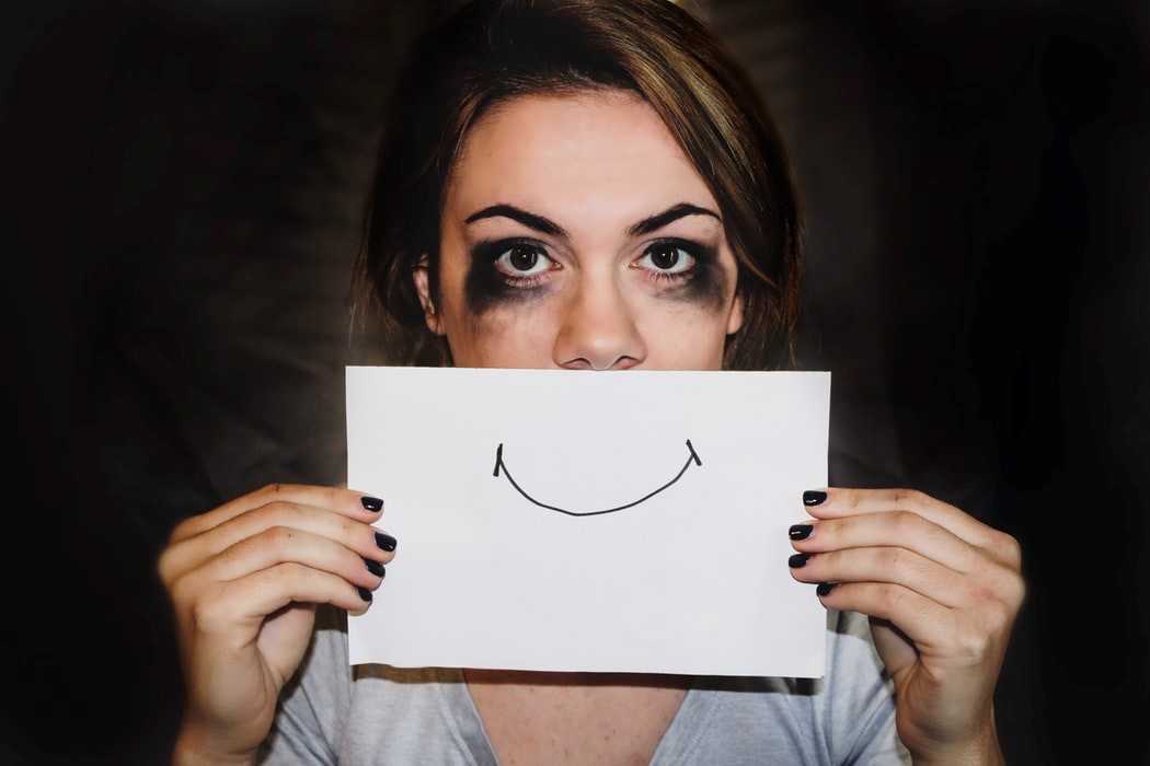 A person posing for the camera
Description automatically generated